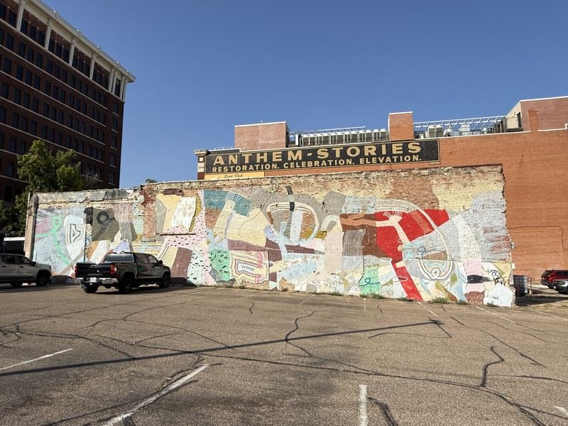 The Quilt on Austin Avenue — Patchwork wall and painted rooftop signs, Waco, Texas
