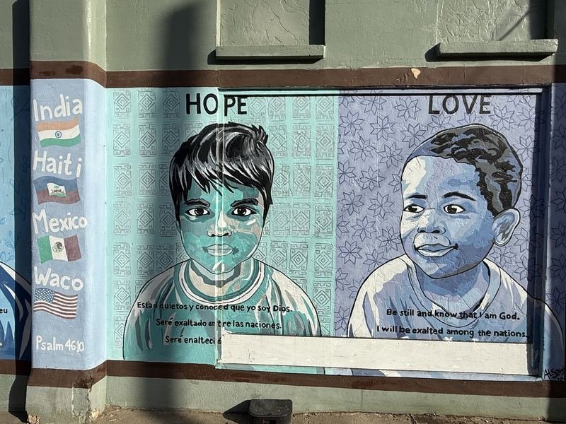 Be Still, in Four Languages — HOPE and LOVE, signed in the far corner