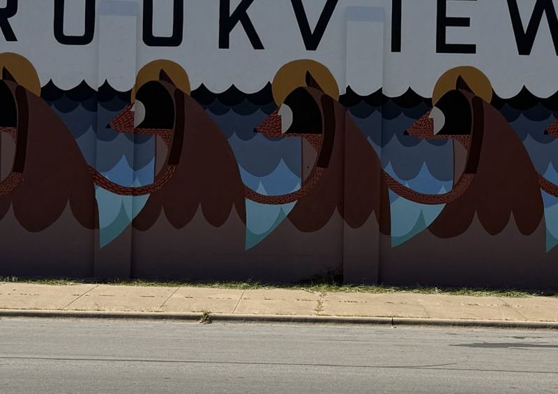 The Choir of 34th Street — Up close — feathers stitched in paint