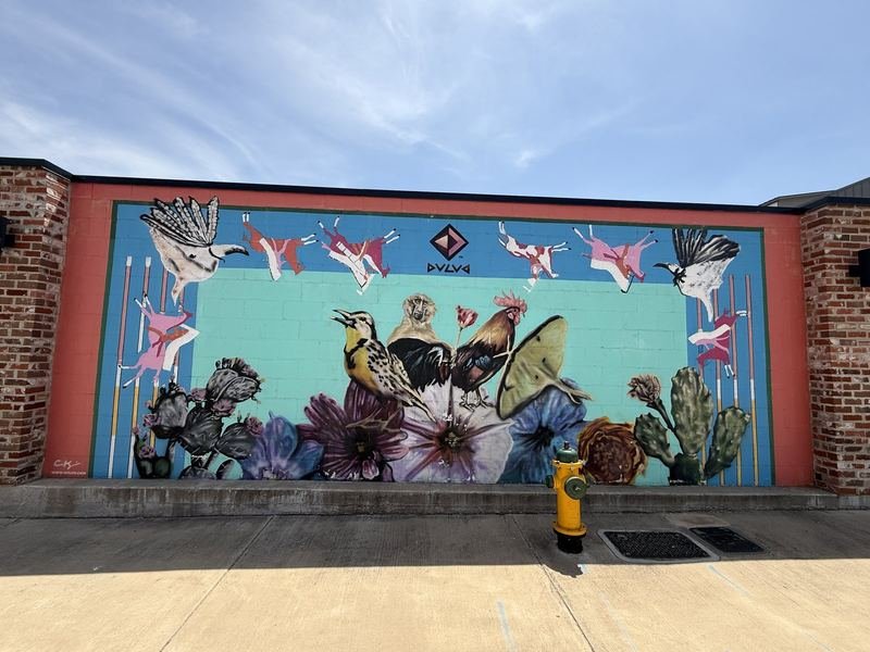 The Wall Where Everything Got Bigger — Meadowlark, baboon, rooster, luna moth