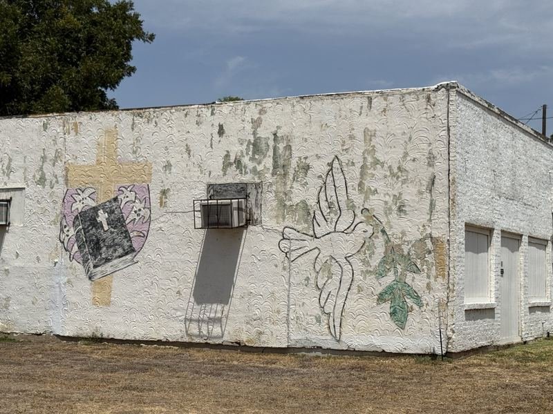 Holy Deliverance โ Weathered painted murals, Waco, Texas