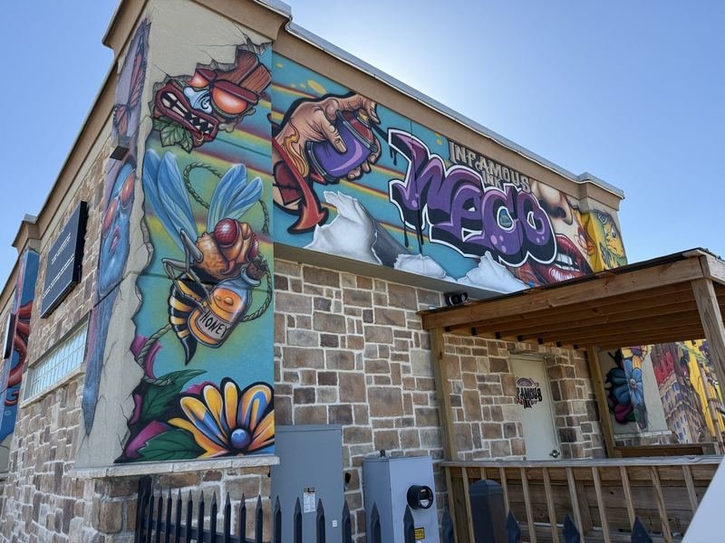 The Building With Tattoos — The bee with the honey grenade