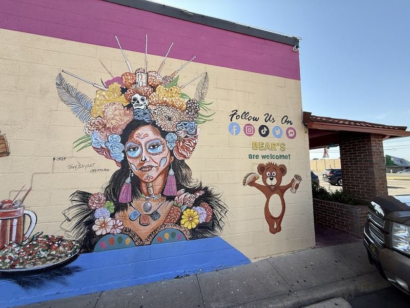 Dinner with the Departed — The catrina in her marigold crown — bears welcome