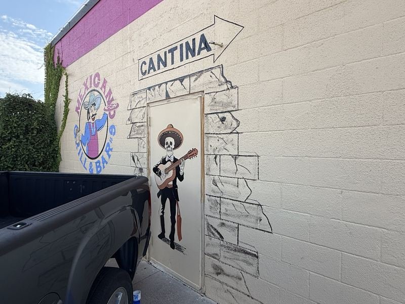 Dinner with the Departed — The cantina door, serenade included