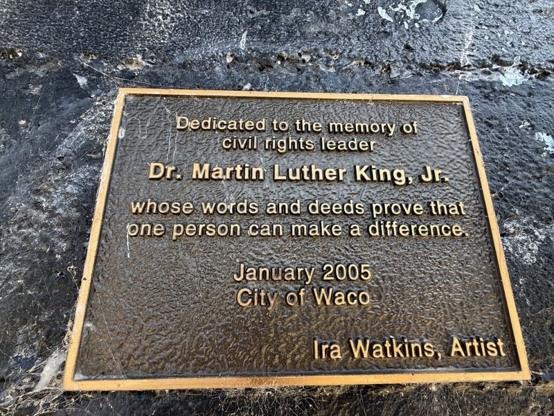 The Dream, Painted on a Bridge Pier โ The bronze plaque: one person can make a difference
