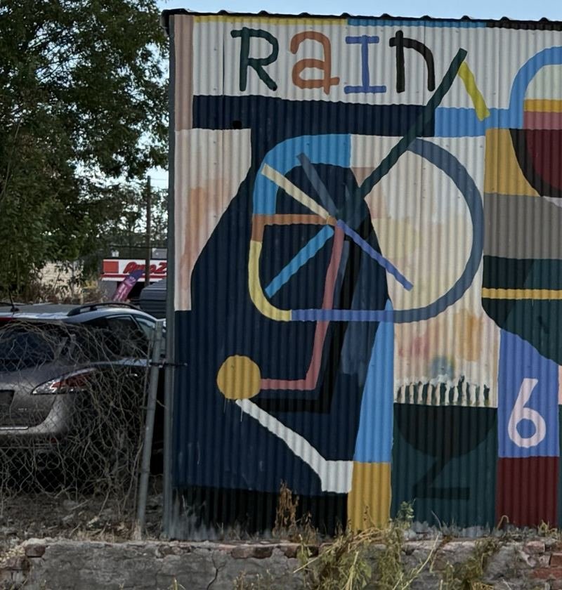 Rain on Corrugated Metal — Closer — find the word