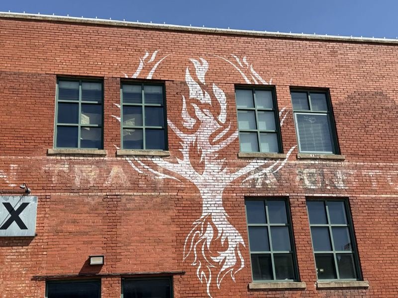 The Building That Rose From Its Ashes — mural in Waco, Texas