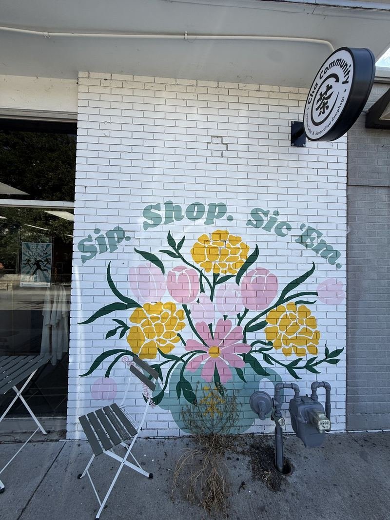 Sip. Shop. Sic ’Em. — Standing under it