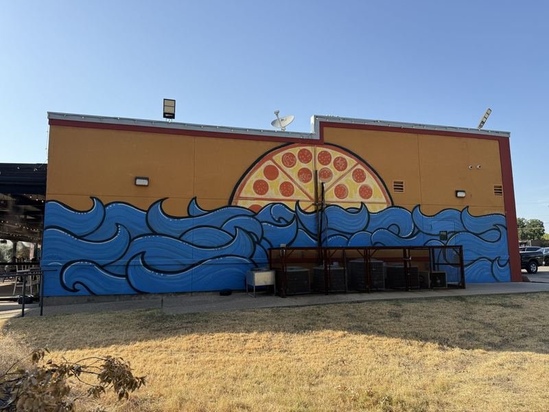 The Pizza Sunrise — mural in Waco, Texas
