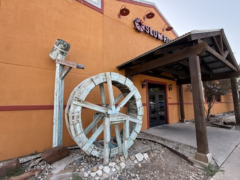 The Pizza Sunrise — The water wheel by the door