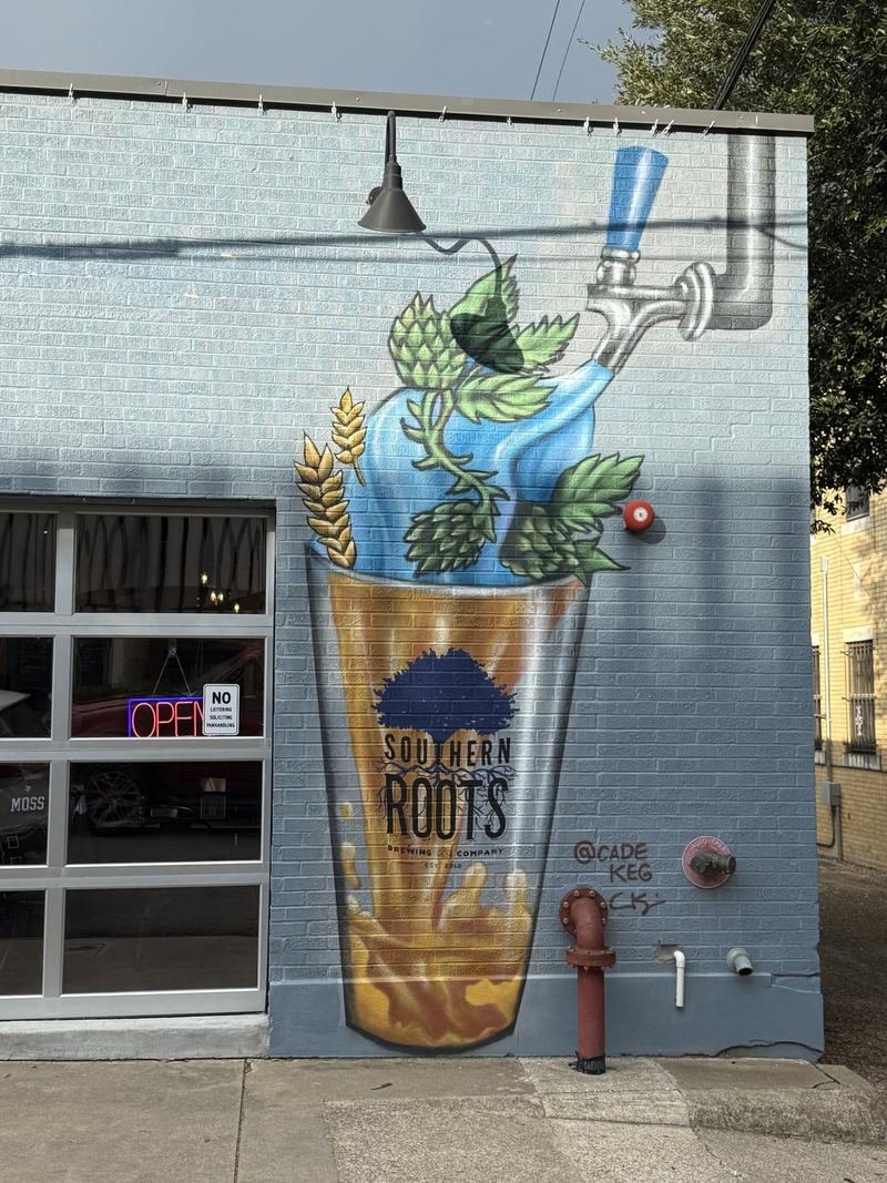 One Very Tall Pint — Southern Roots Brewing pint-glass wall, Waco, Texas