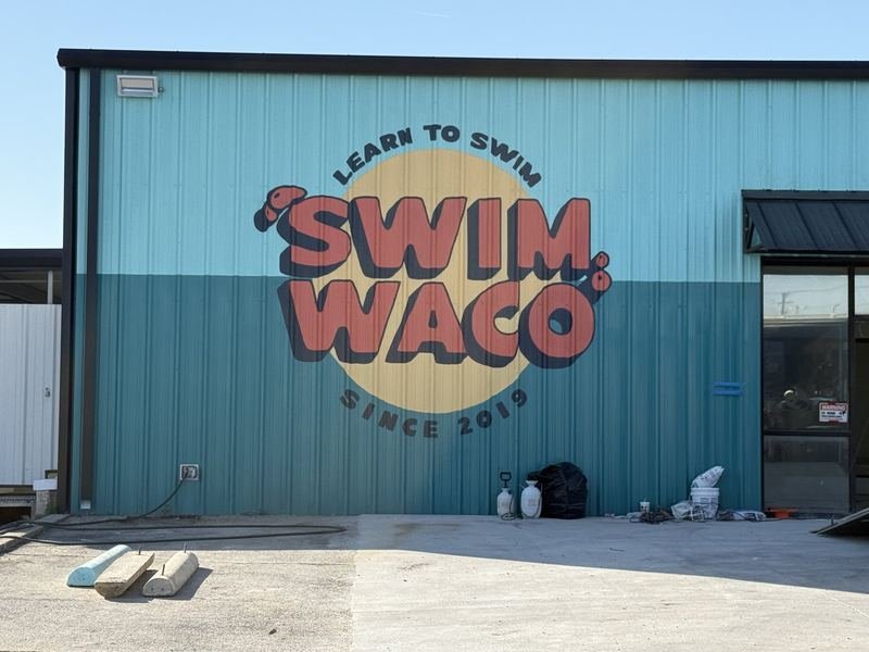 The Waterline — Swim Waco painted logo wall, Waco, Texas