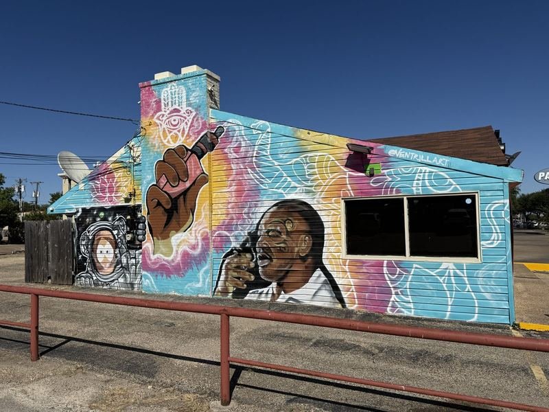 The House in Tie-Dye — The other gable — the fist, the astronaut, the singer