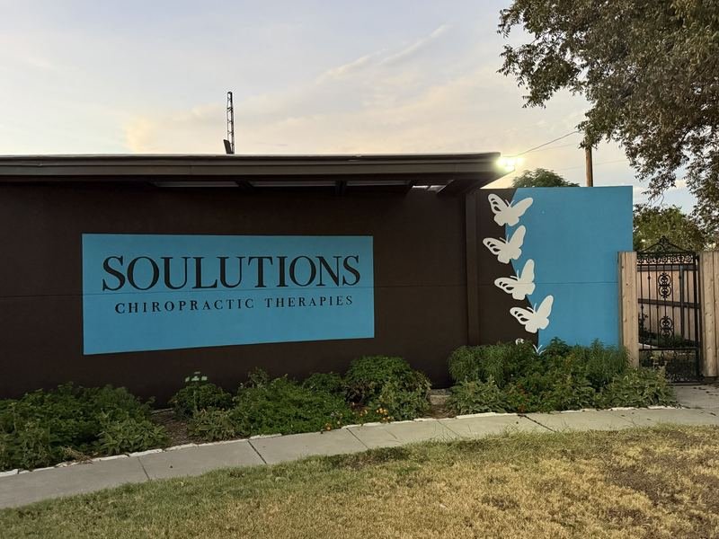 You Are Loved — The sign wall — Soulutions, and three cut-out butterflies
