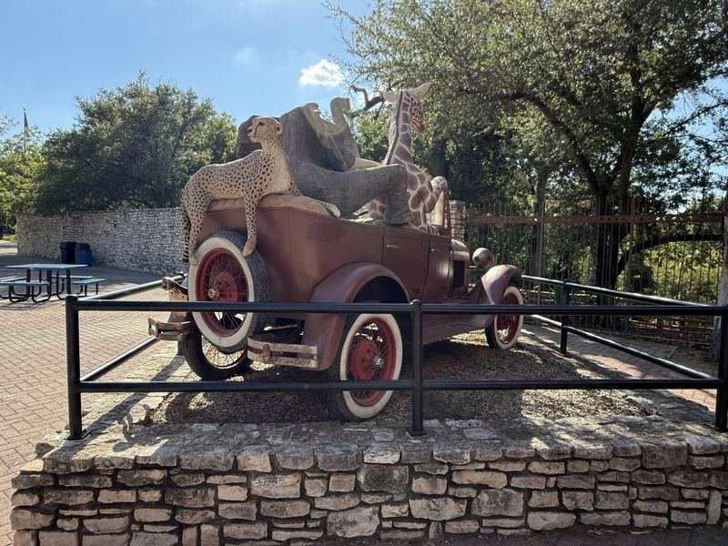 On the Road to Extinction — From behind — the cheetah riding the trunk