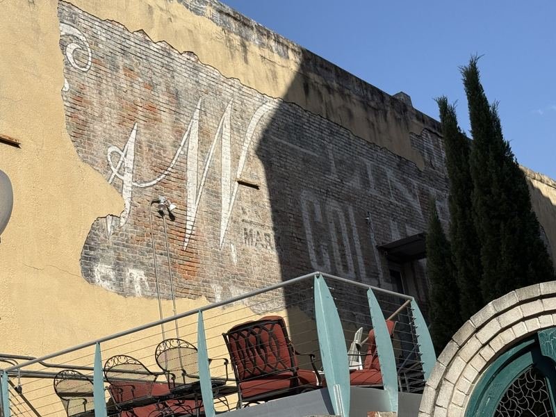 The Sentence Nobody Can Finish — hand-painted sign in Waco, Texas