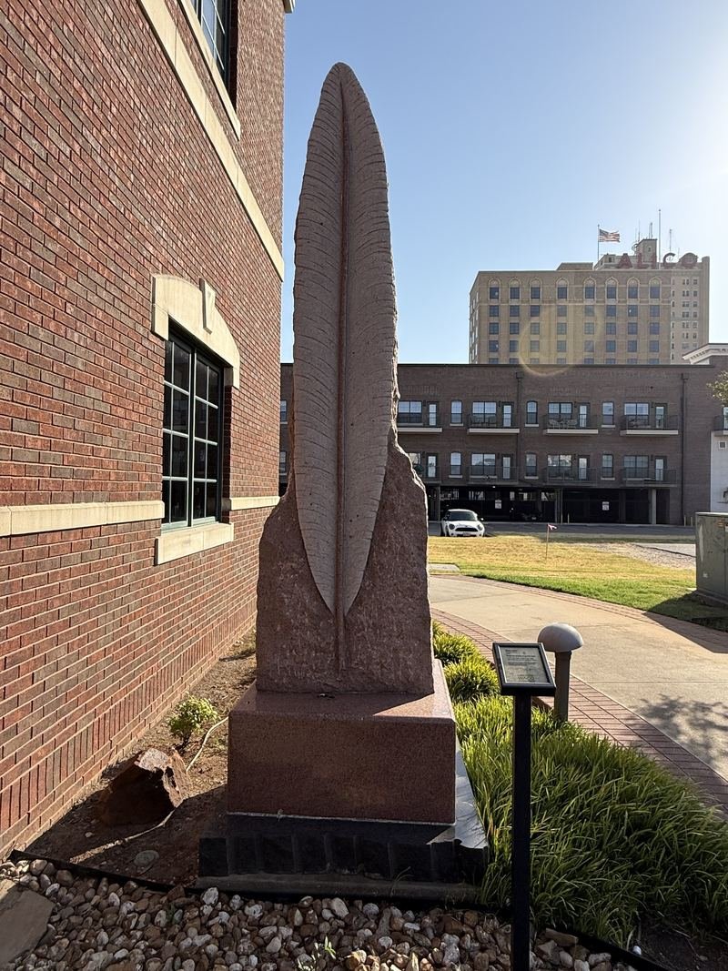 The Feather Made of Stone — Against the brick of the Chamber